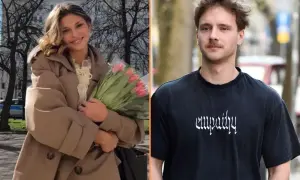 Uśmiechnięta kobieta z bukietem tulipanów i mężczyzna w koszulce z napisem "empathy". Czy to z kim naprawdę spotyka się teraz najpopularniejszy polski kawaler?