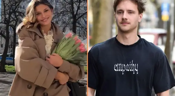 Uśmiechnięta kobieta z bukietem tulipanów i mężczyzna w koszulce z napisem "empathy". Czy to z kim naprawdę spotyka się teraz najpopularniejszy polski kawaler?