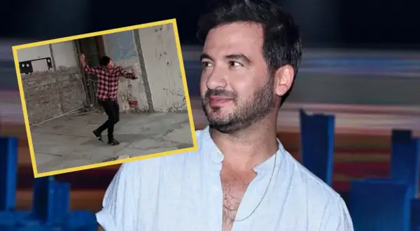 Stefano Terrazzino w kadrze, w tle jego taniec w surowym wnętrzu. Wzrost artysty jest imponujący.