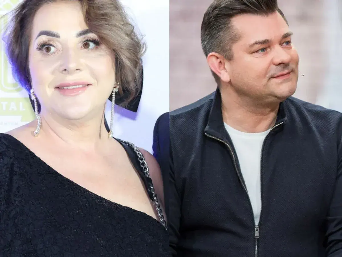 Danuta Martyniuk, znana jako "cyganka", w czarnej koronkowej sukni obok mężczyzny w granatowej kurtce.