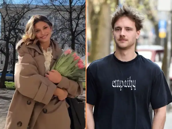 Uśmiechnięta kobieta z bukietem tulipanów i mężczyzna w koszulce z napisem "empathy". Czy to z kim naprawdę spotyka się teraz najpopularniejszy polski kawaler?