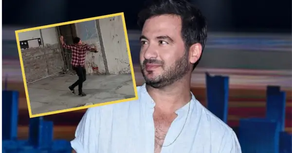 Stefano Terrazzino w kadrze, w tle jego taniec w surowym wnętrzu. Wzrost artysty jest imponujący.